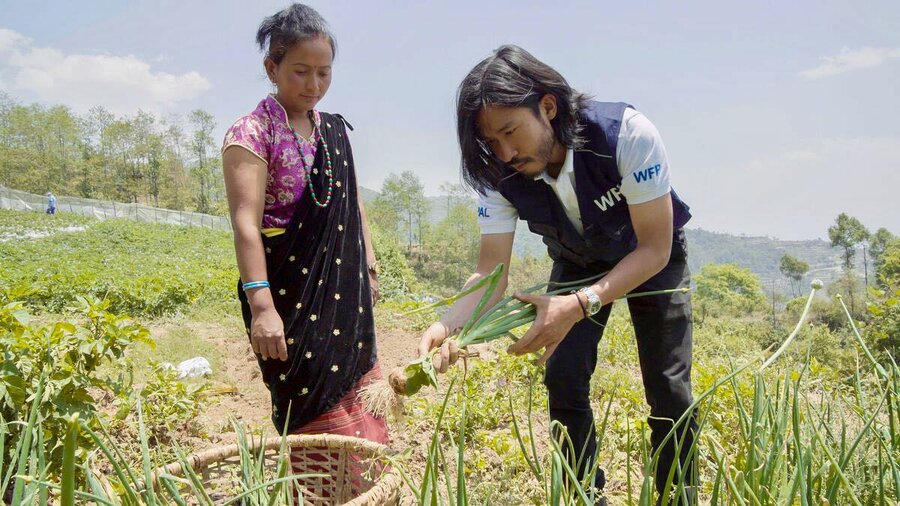 Farmer Krishna Maya (L) has been supplying vegetables to &nbsp;Ganesh primary school for the past three years. Photo: WFP/Srawan Shrestha
